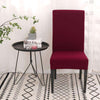 Fundas de silla universales de color rojo intenso para decoración moderna, con mesa redonda negra y alfombra estampada, a la venta en blueemoonco.com