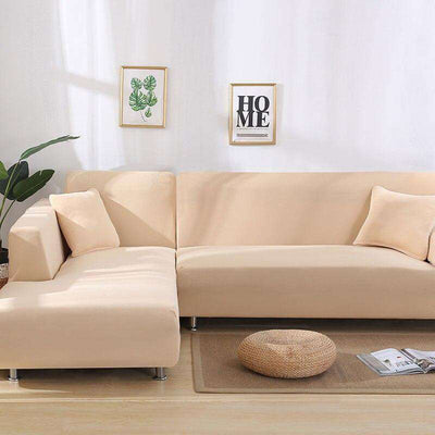 Fundas para sofá color beige en una sala de estar moderna con decoración minimalista, disponibles en blueemoonco.com