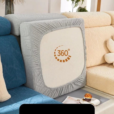 Protector de brazo de sofá gris con patrón de costura en relieve y logo de 360 grados en el centro, ideal para la protección y renovación del mobiliario del hogar.